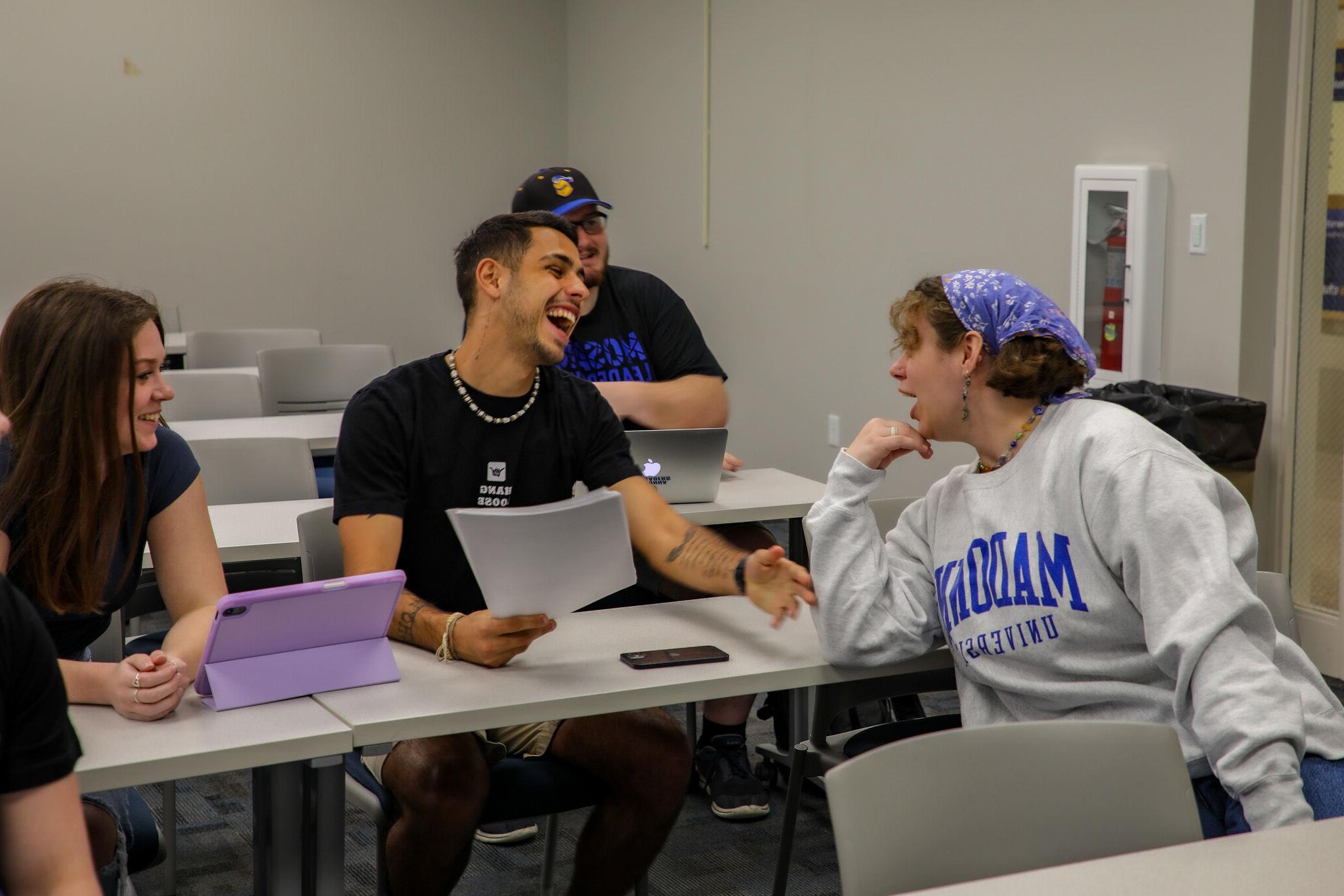 Students laughing in a classroom